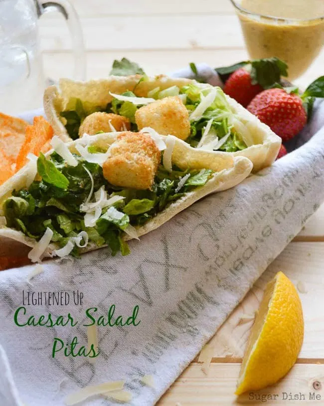 https://www.sugardishme.com/wp-content/uploads/2013/03/Lightened-Up-Caesar-Salad-Pitas.jpg.webp